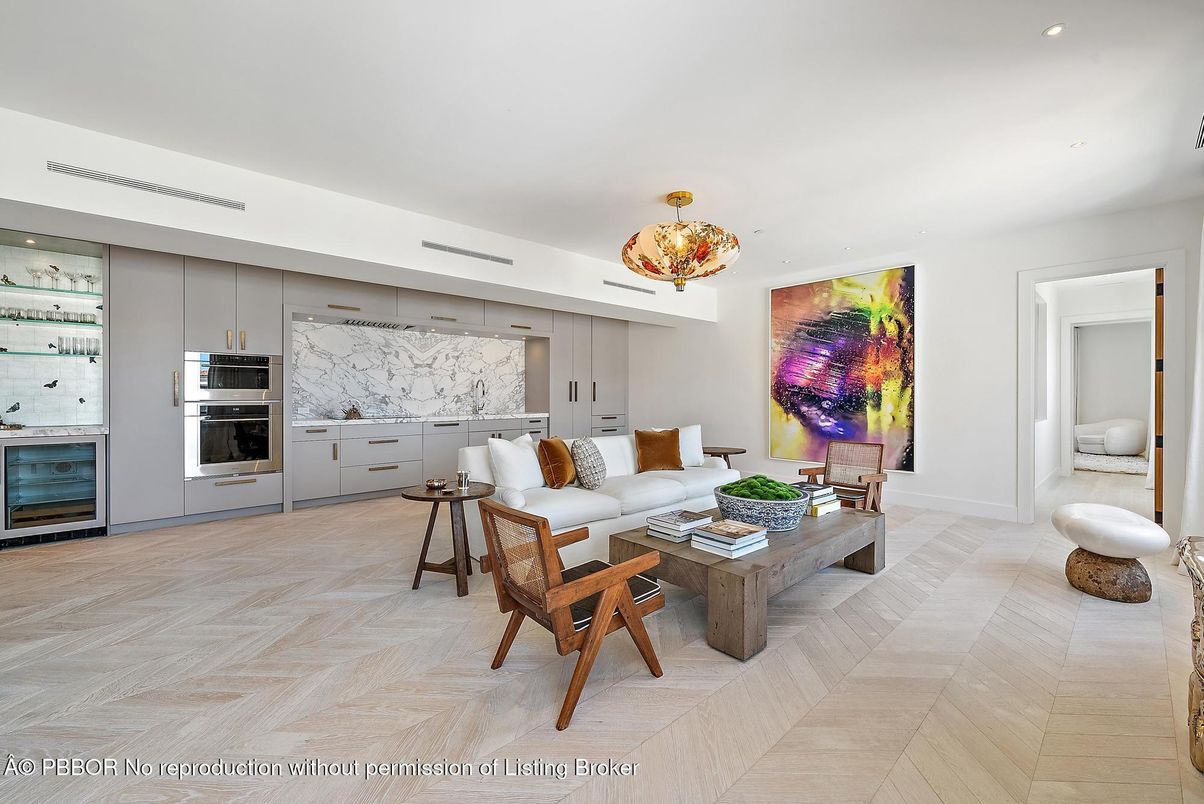 Chandelier, Interior, Kitchen, Living room, Marble Walls, Recessed Lighting, Stainless Steel Appliances, Wood Texture Flooring