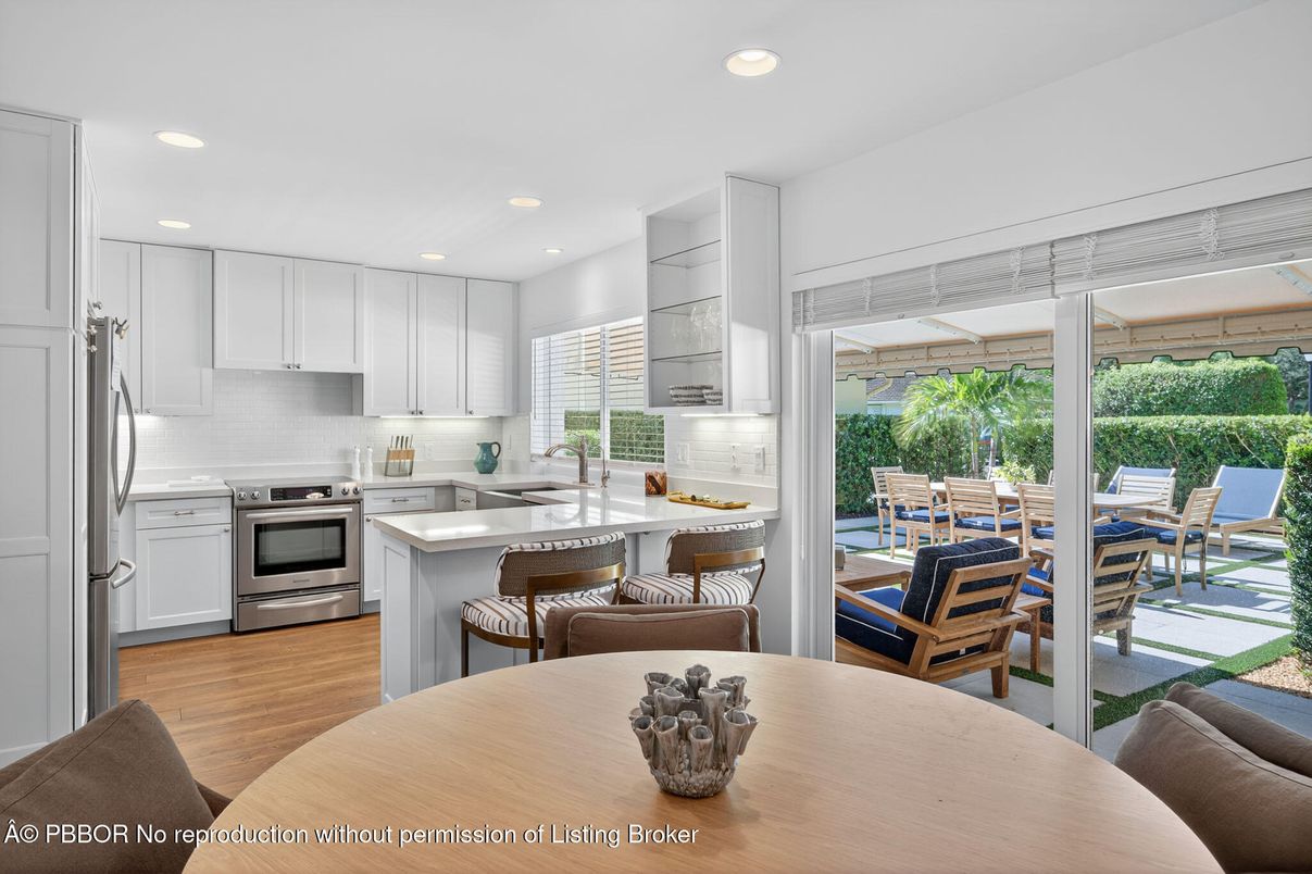 Dining room, Interior, Kitchen, Recessed Lighting, Stainless Steel Appliances, Wood Texture Flooring