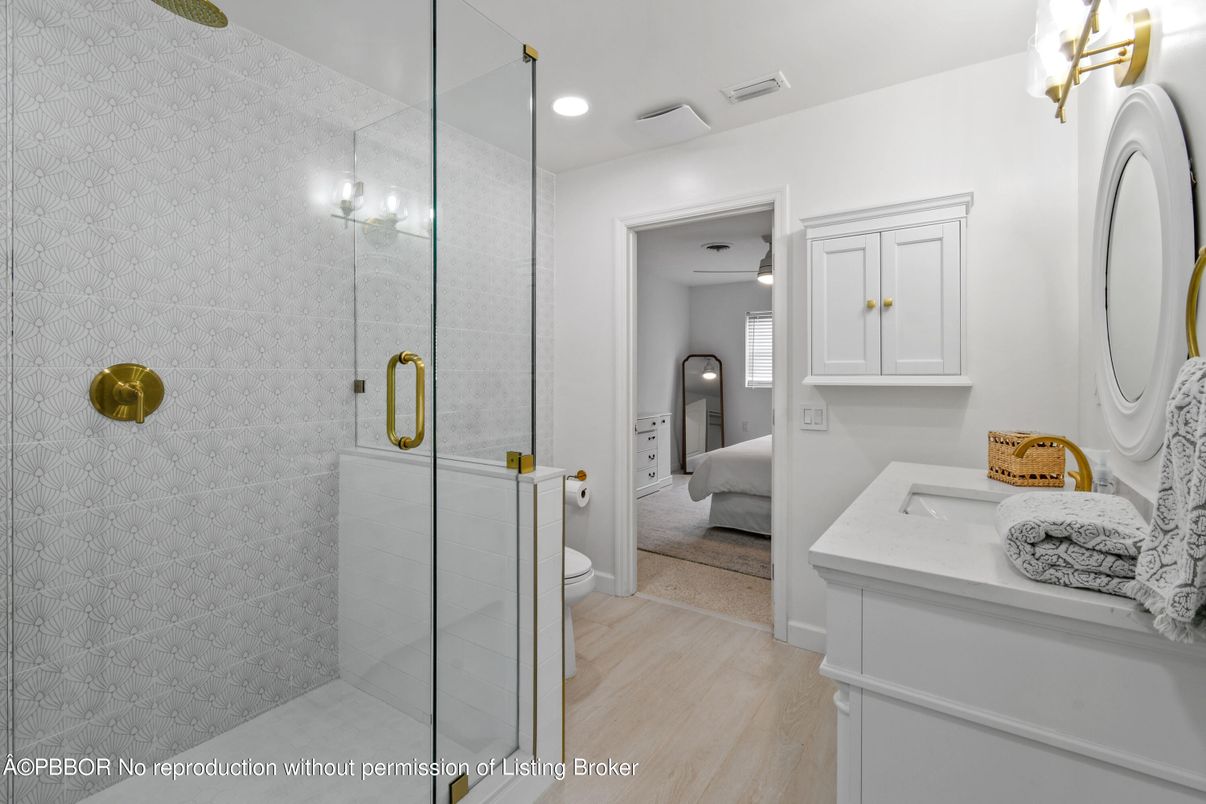 Bathroom, Bedroom, Glass Shower, Interior, Recessed Lighting, Wood Texture Flooring