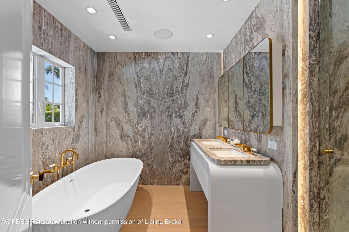 Bathroom, Free Standing Baths, Interior, Marble Walls, Recessed Lighting, Wood Texture Flooring
