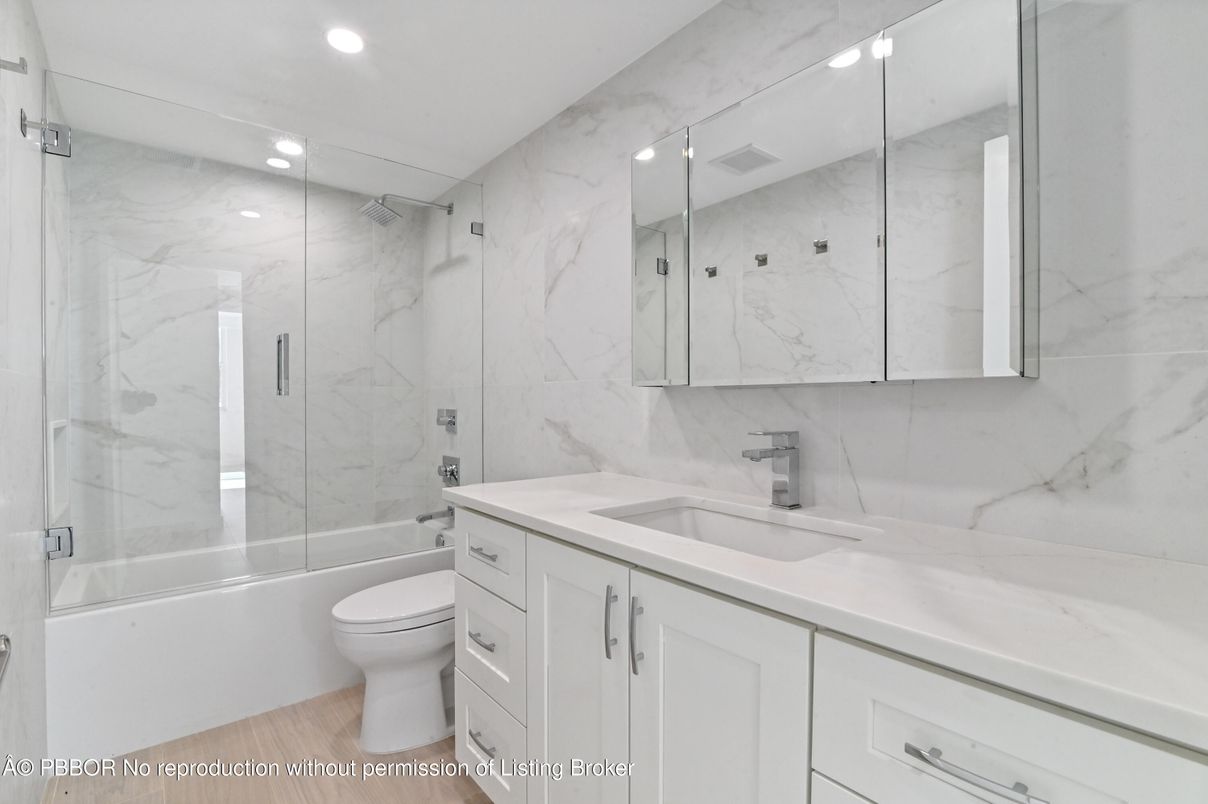 Bathroom, Glass Shower, Interior, Marble Walls, Recessed Lighting, Wood Texture Flooring