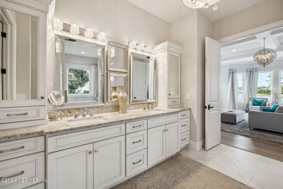 Bathroom, Chandelier, Dual Sink Vanities, Interior, Marble, Pendant Lights, Recessed Lighting, Wood Texture Flooring