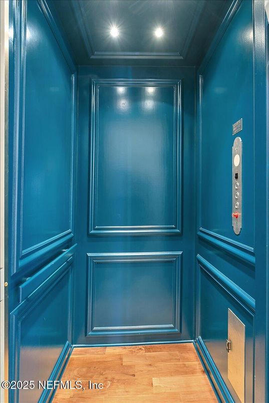 Elevator, Interior, Recessed Lighting, Wood Texture Flooring, Wooden Walls