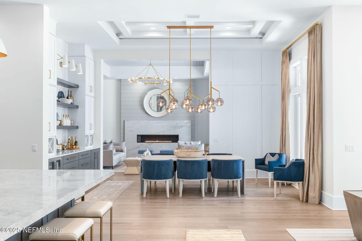 Dining room, Fireplace, Interior, Living room, Pendant Lights, Recessed Lighting, Wood Texture Flooring