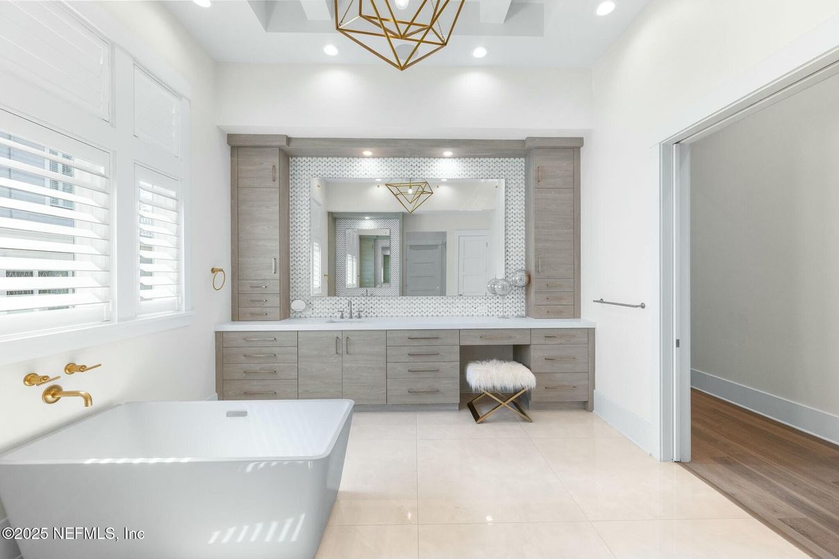 Bathroom, Dual Sink Vanities, Free Standing Baths, Interior, Pendant Lights, Recessed Lighting, Wood Texture Flooring