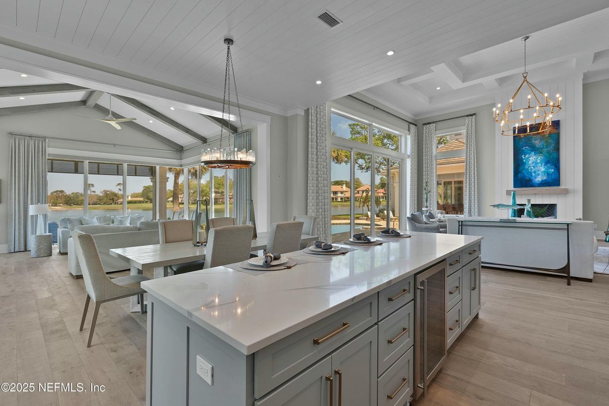 Chandelier, Dining room, Interior, Kitchen, Pendant Lights, Recessed Lighting, Water, Wood Texture Flooring