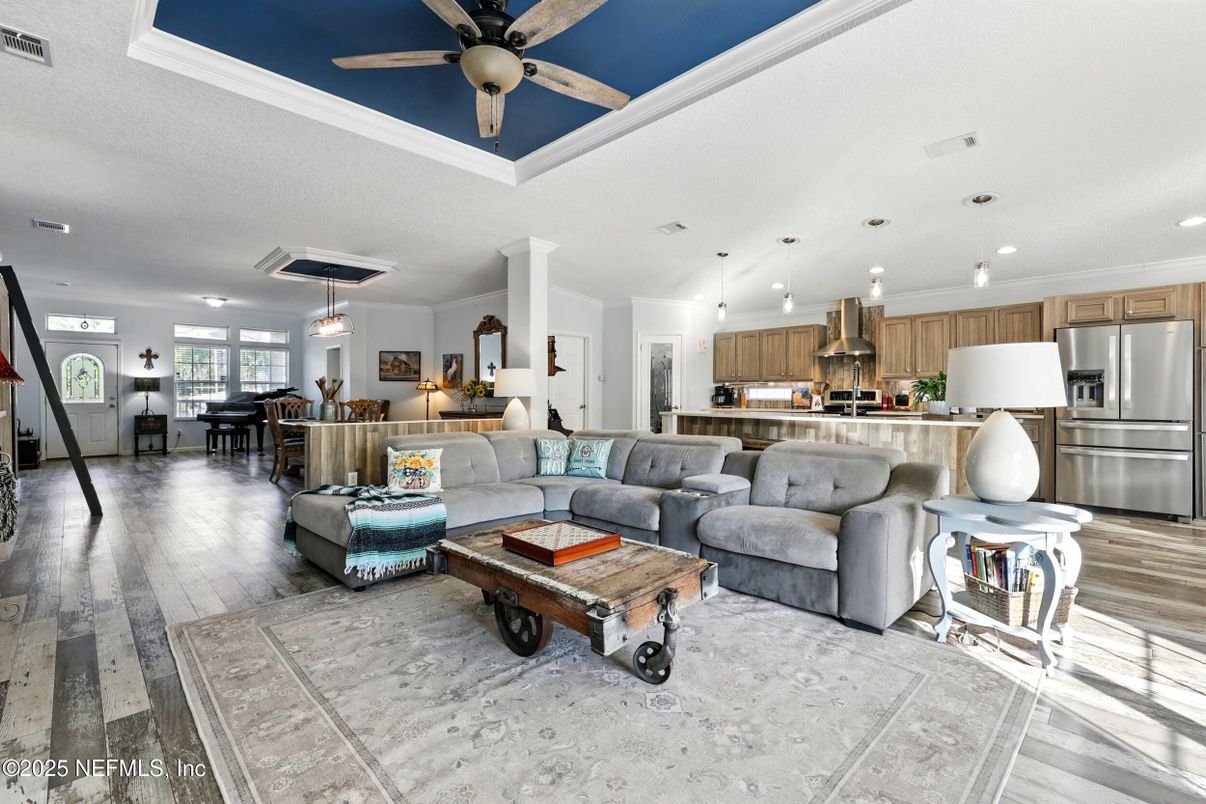 Dining room, Interior, Kitchen, Living room, Pendant Lights, Recessed Lighting, Stainless Steel Appliances, Wood Texture Flooring