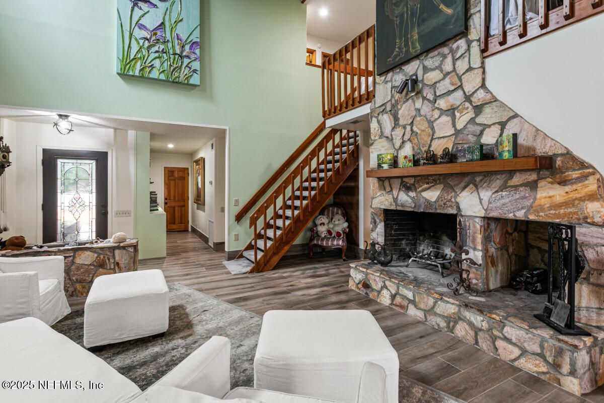 Fireplace, Interior, Living room, Recessed Lighting, Stone Walls, Wood Texture Flooring