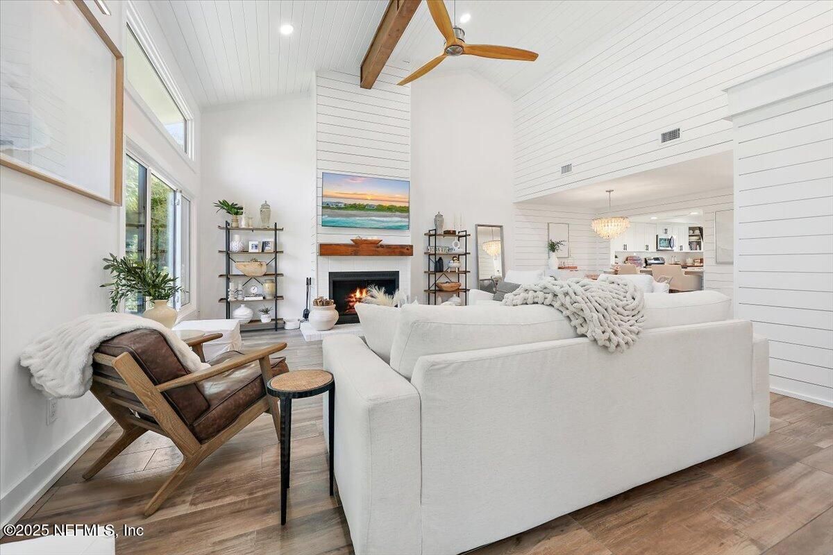 Chandelier, Dining room, Fireplace, Interior, Living room, Recessed Lighting, Wood Texture Flooring