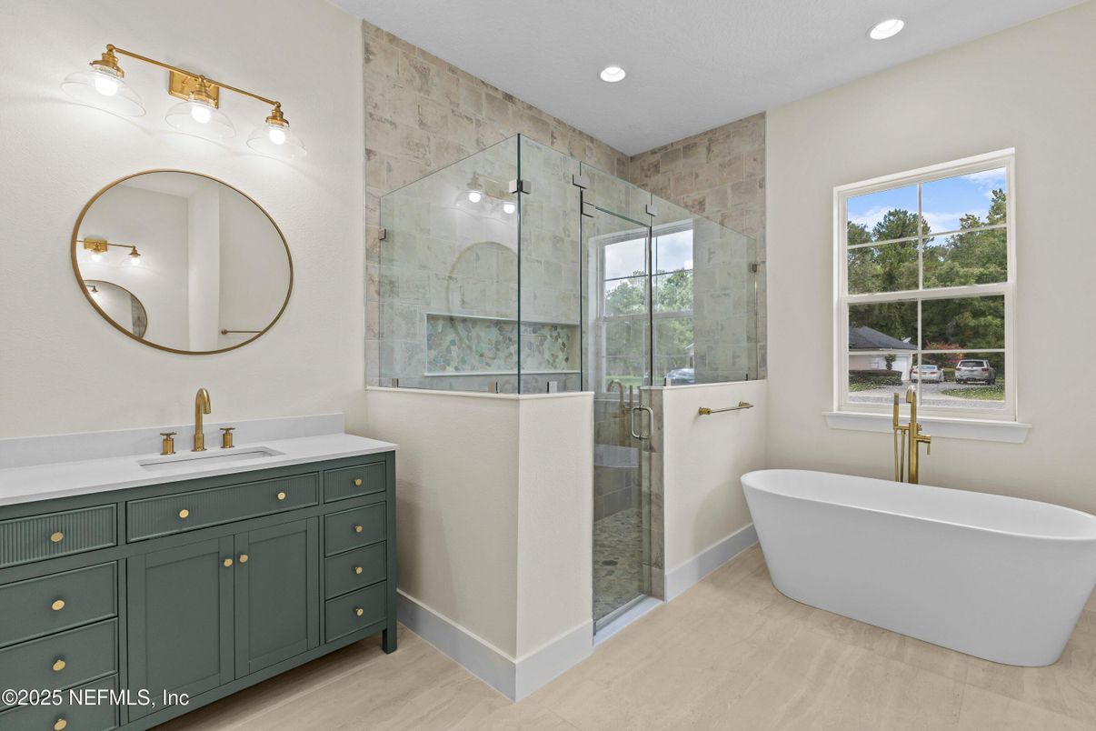 Bathroom, Dual Sink Vanities, Free Standing Baths, Glass Shower, Interior, Recessed Lighting, Wood Texture Flooring