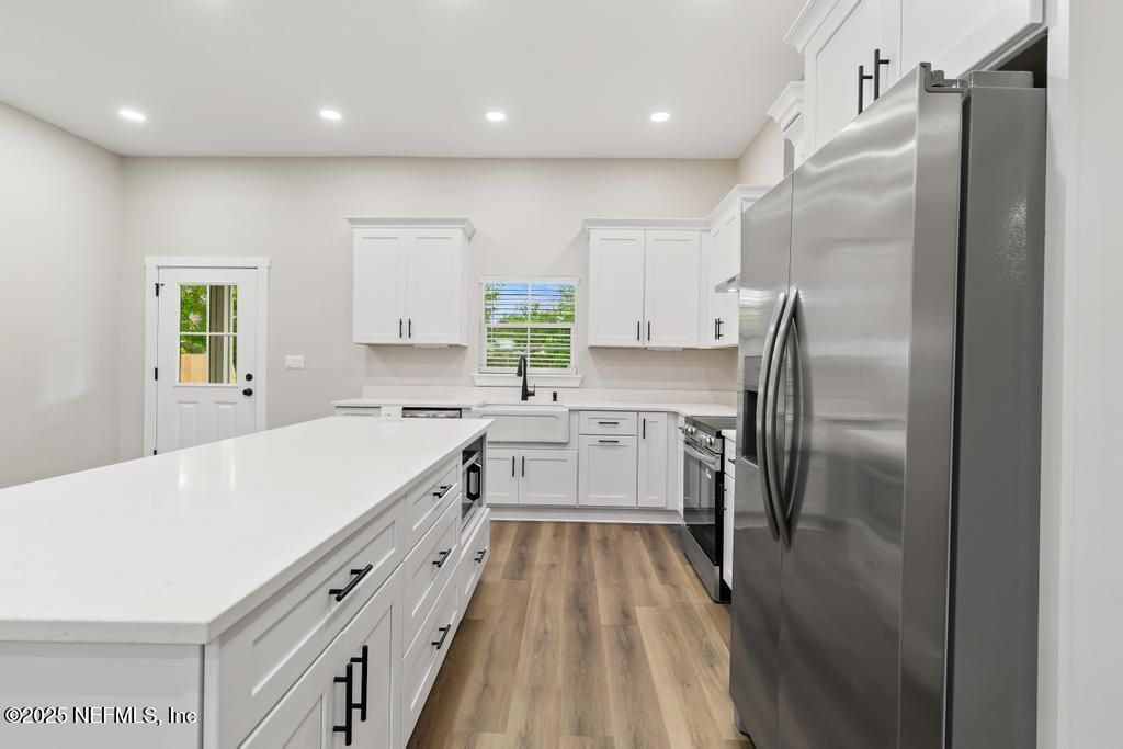 Interior, Kitchen, Recessed Lighting, Stainless Steel Appliances, Wood Texture Flooring