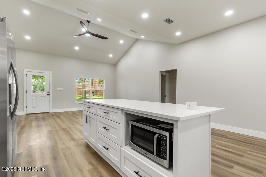Interior, Kitchen, Recessed Lighting, Stainless Steel Appliances, Wood Texture Flooring