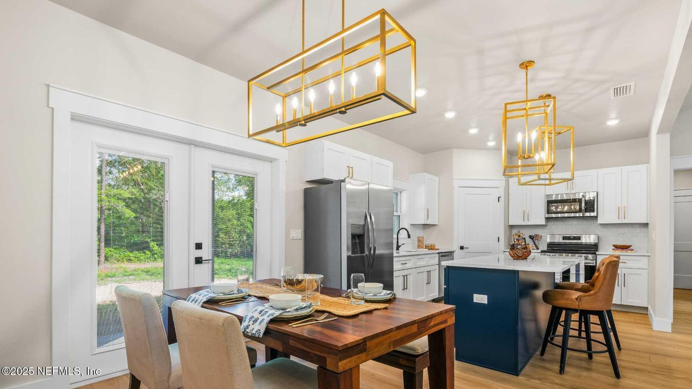 Dining room, Interior, Kitchen, Pendant Lights, Recessed Lighting, Stainless Steel Appliances, Wood Texture Flooring