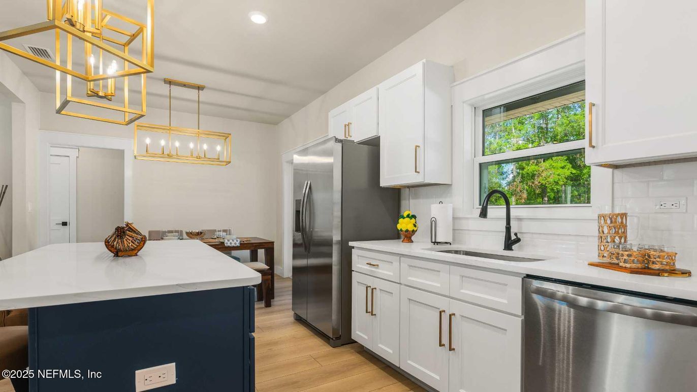 Dining room, Interior, Kitchen, Pendant Lights, Recessed Lighting, Stainless Steel Appliances, Wood Texture Flooring