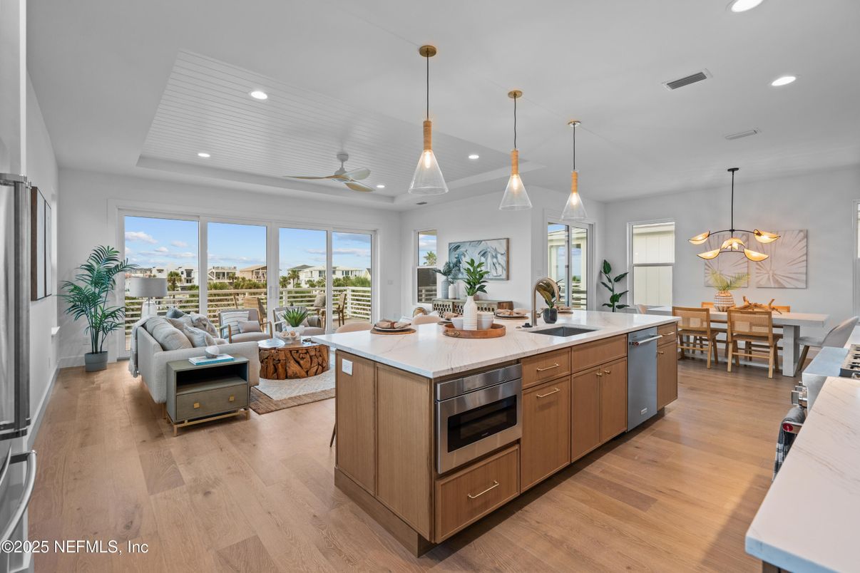 Dining room, Interior, Kitchen, Living room, Pendant Lights, Recessed Lighting, Stainless Steel Appliances, Wood Texture Flooring