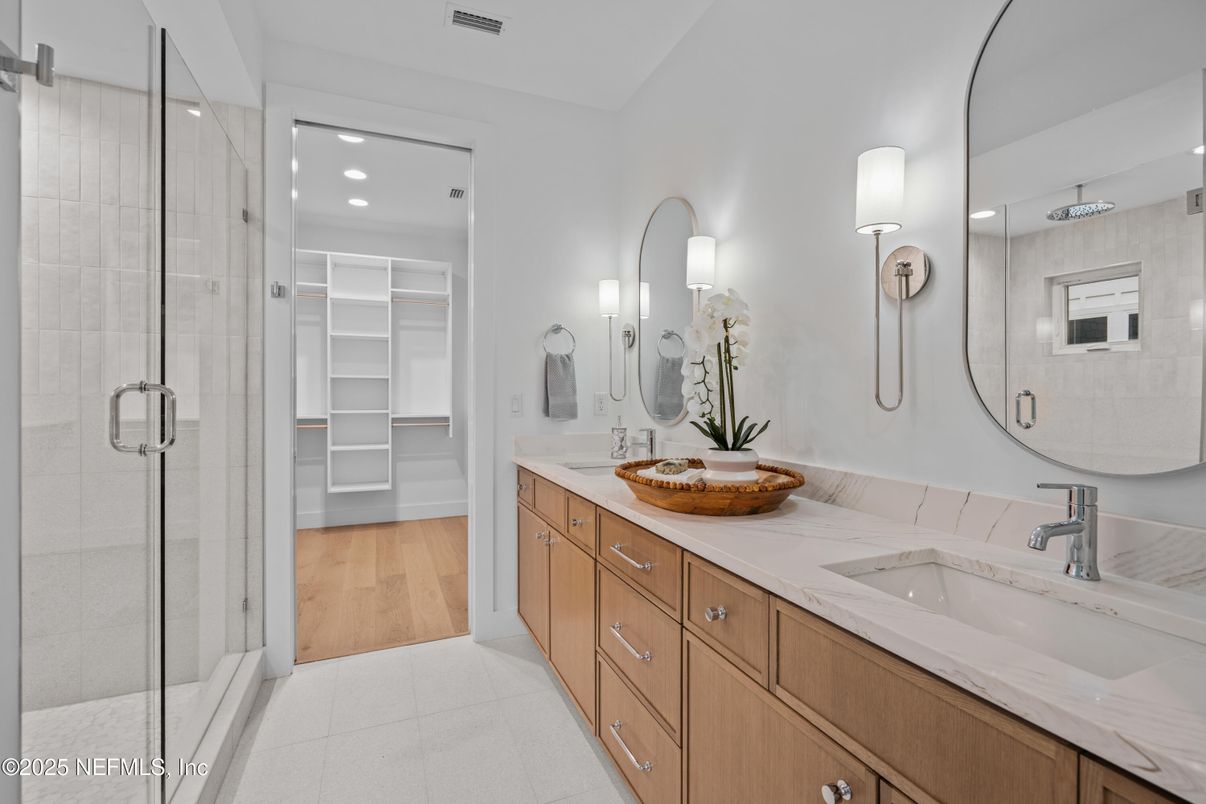 Bathroom, Dual Sink Vanities, Glass Shower, Interior, Recessed Lighting, Walk-in Closets, Wood Texture Flooring