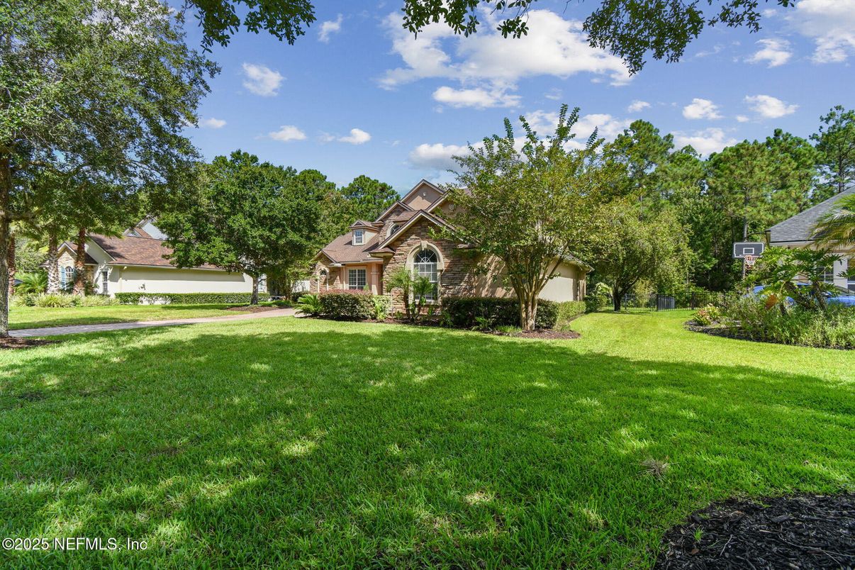 Attached, Backyard, Exterior, Facade, Brick Facade, Tudor Revival