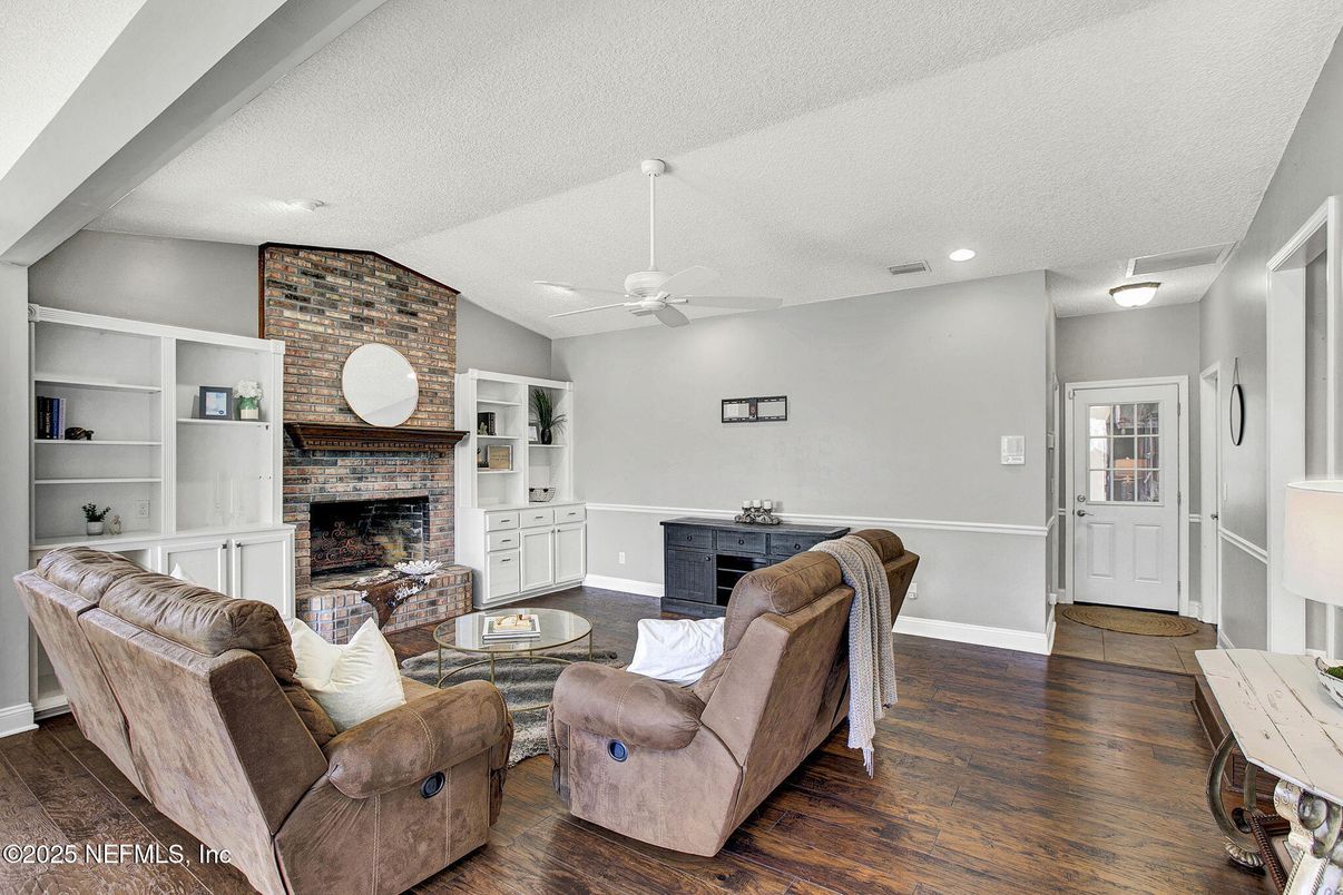 Fireplace, Interior, Living room, Recessed Lighting, Stone Walls, Wood Texture Flooring