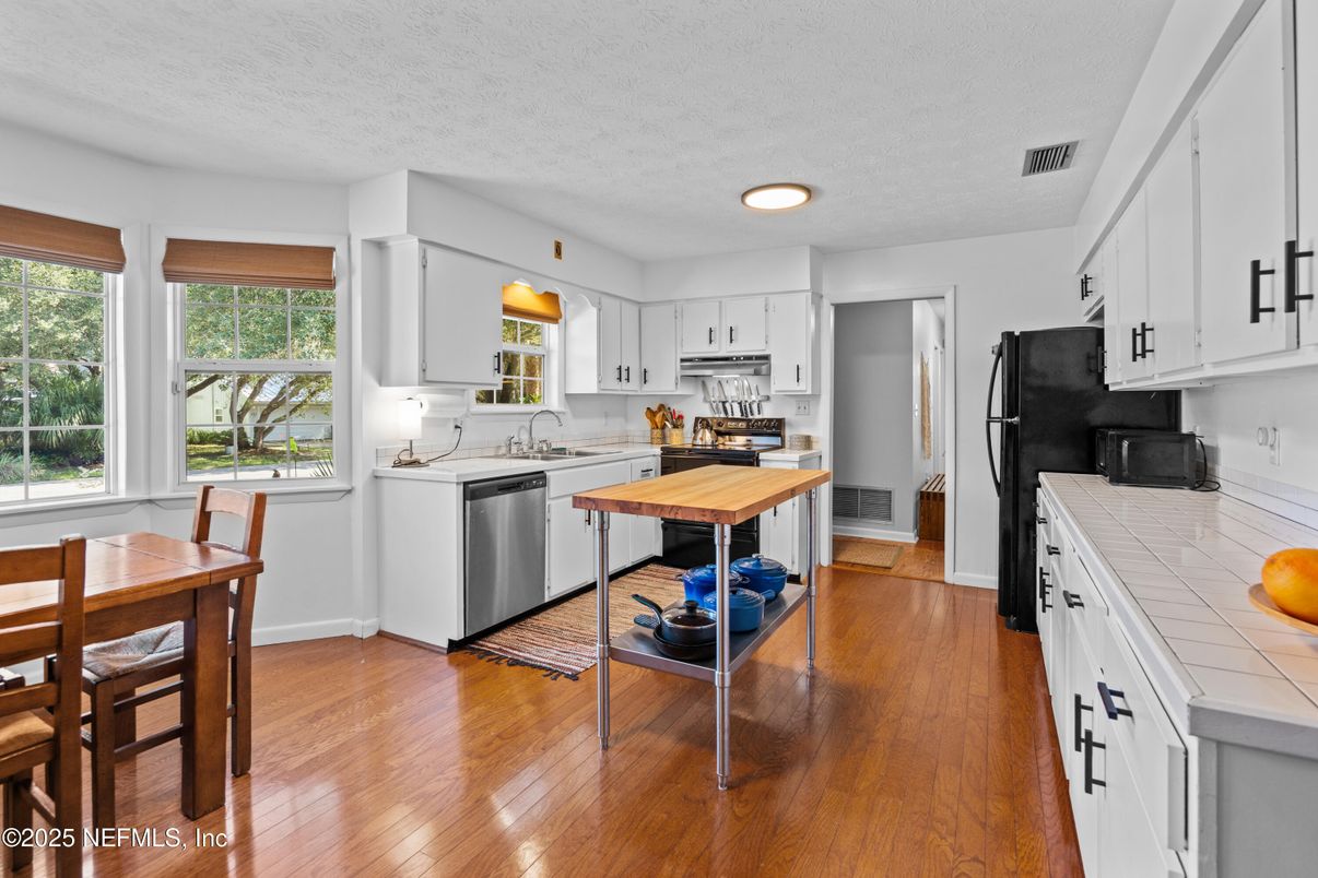 Dining room, Interior, Kitchen, Recessed Lighting, Tile Countertops, Wood Texture Flooring