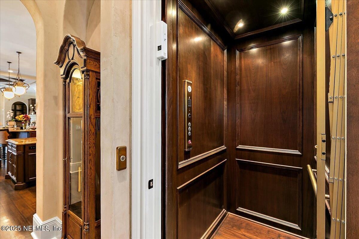 Elevator, Interior, Recessed Lighting, Wood Texture Flooring, Wooden Walls