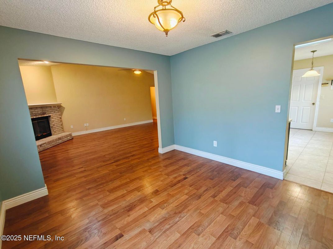 Empty room, Fireplace, Interior, Pendant Lights, Wood Texture Flooring