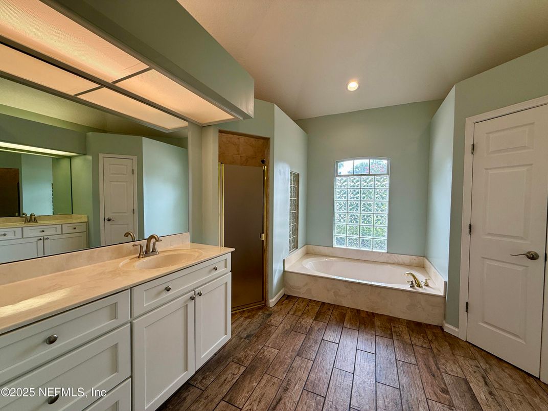 Bathroom, Dual Sink Vanities, Interior, Recessed Lighting, Wood Texture Flooring