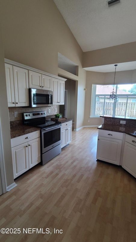 Interior, Kitchen, Pendant Lights, Stainless Steel Appliances, Wood Texture Flooring