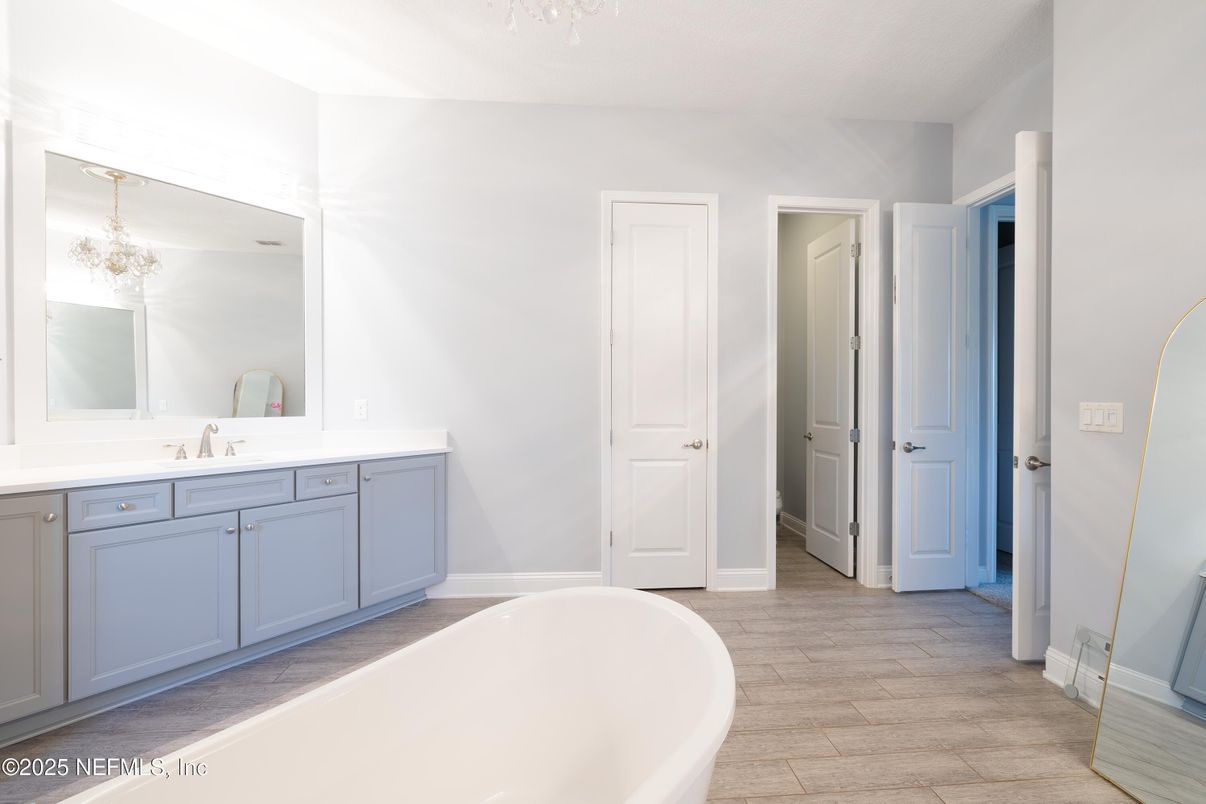 Bathroom, Dual Sink Vanities, Free Standing Baths, Interior, Wood Texture Flooring
