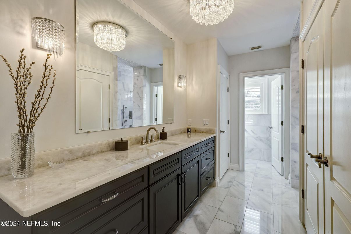Bathroom, Chandelier, Dual Sink Vanities, Interior, Marble, Marble Walls