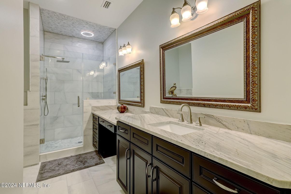 Bathroom, Dual Sink Vanities, Glass Shower, Interior, Marble, Marble Walls, Recessed Lighting