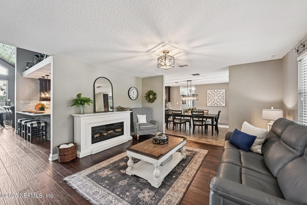 Chandelier, Dining room, Fireplace, Interior, Living room, Pendant Lights, Wood Texture Flooring