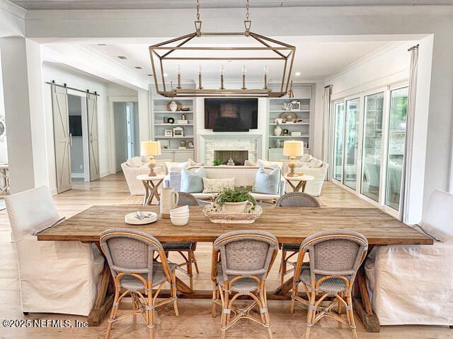 Dining room, Fireplace, Interior, Living room, Pendant Lights, Recessed Lighting, Wood Texture Flooring