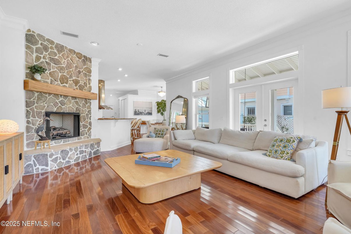 Fireplace, Interior, Living room, Recessed Lighting, Stone Walls, Wood Texture Flooring