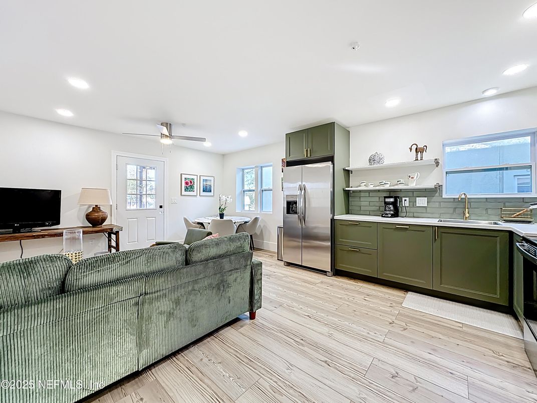 Dining room, Interior, Kitchen, Living room, Recessed Lighting, Stainless Steel Appliances, Wood Texture Flooring