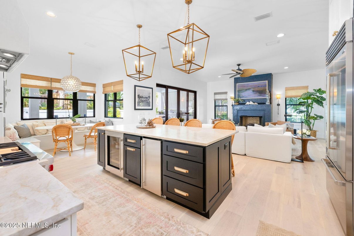 Dining room, Fireplace, Interior, Kitchen, Living room, Pendant Lights, Recessed Lighting, Stainless Steel Appliances, Wood Texture Flooring