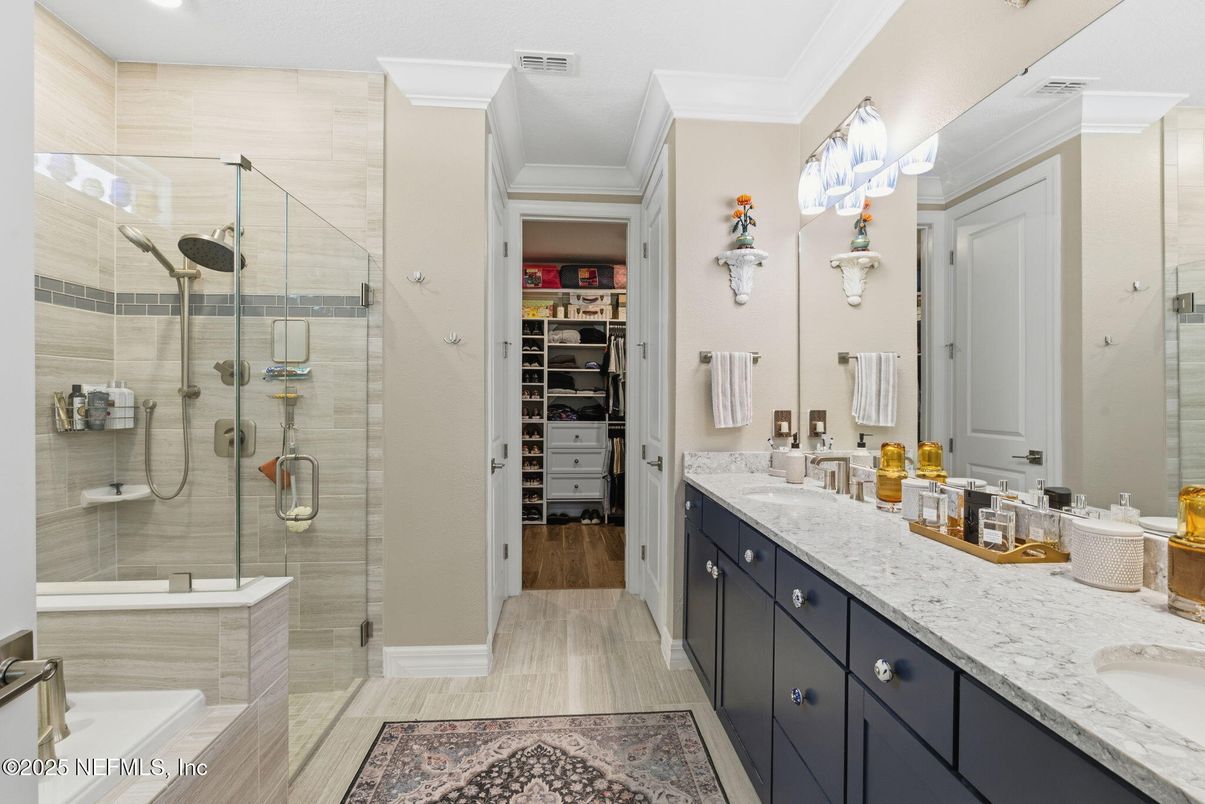 Bathroom, Dual Sink Vanities, Glass Shower, Interior, Recessed Lighting, Walk-in Closets, Wood Texture Flooring