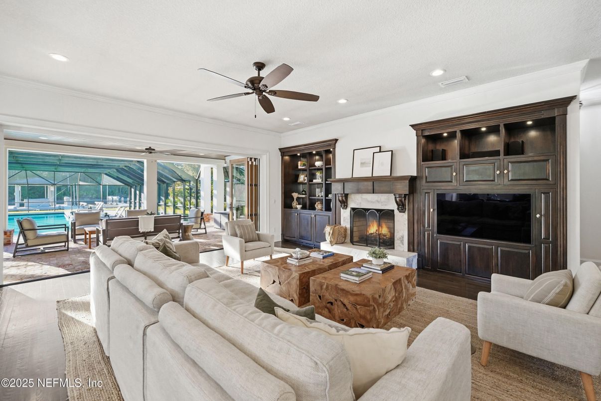Dining room, Fireplace, Interior, Living room, Recessed Lighting, Wood Texture Flooring