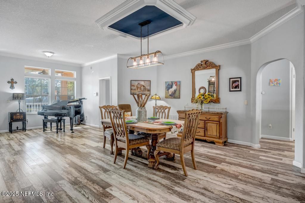 Dining room, Interior, Pendant Lights, Piano, Wood Texture Flooring