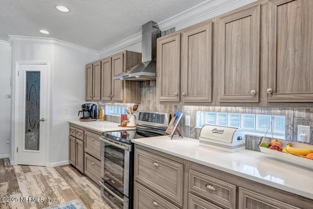 Interior, Kitchen, Recessed Lighting, Washer, Wood Texture Flooring