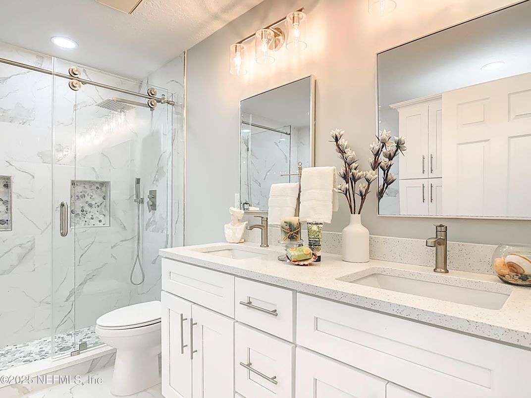 Bathroom, Dual Sink Vanities, Glass Shower, Interior, Marble, Marble Walls, Recessed Lighting