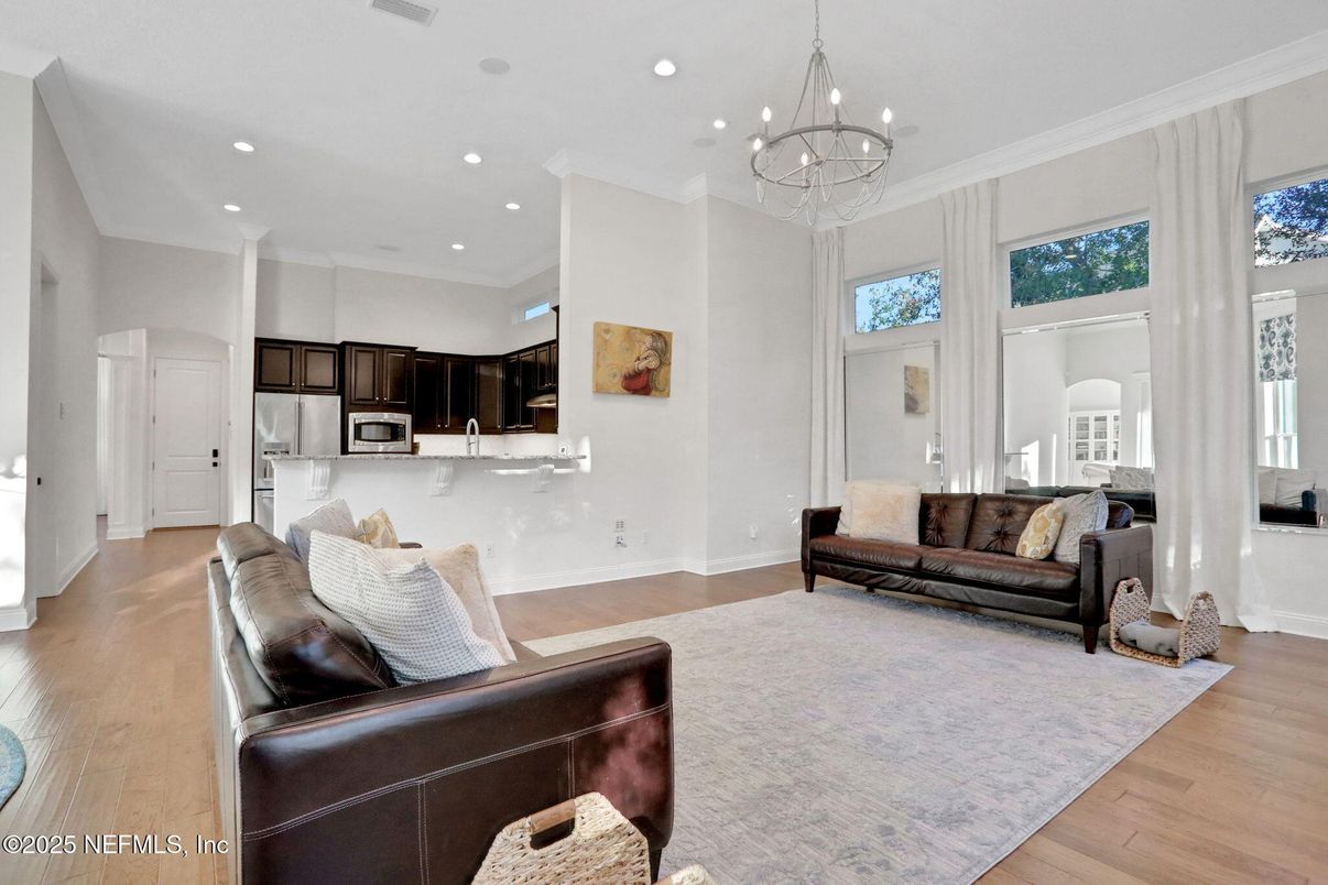 Chandelier, Interior, Kitchen, Living room, Recessed Lighting, Stainless Steel Appliances, Wood Texture Flooring