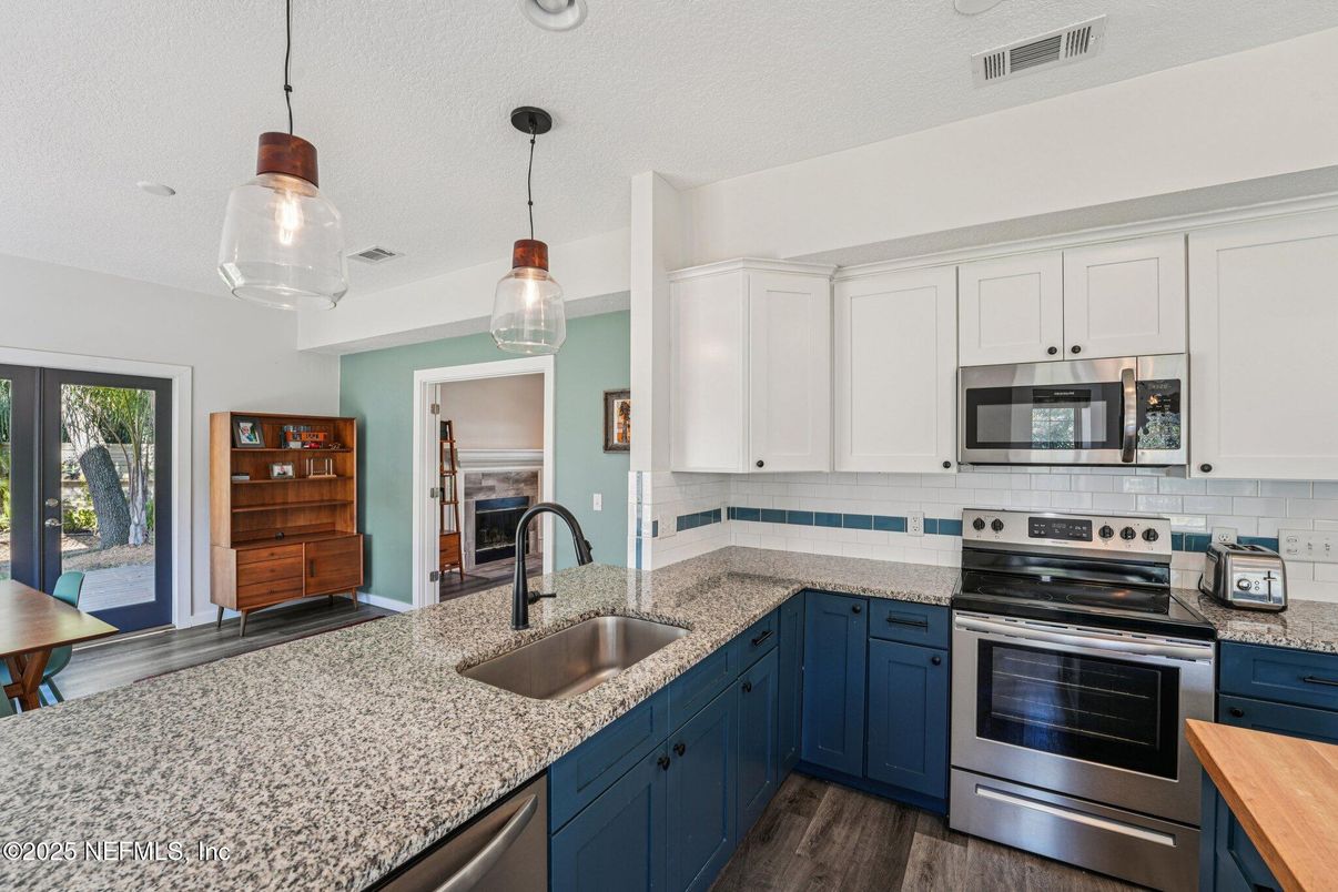 Interior, Kitchen, Pendant Lights, Stainless Steel Appliances, Wood Texture Flooring