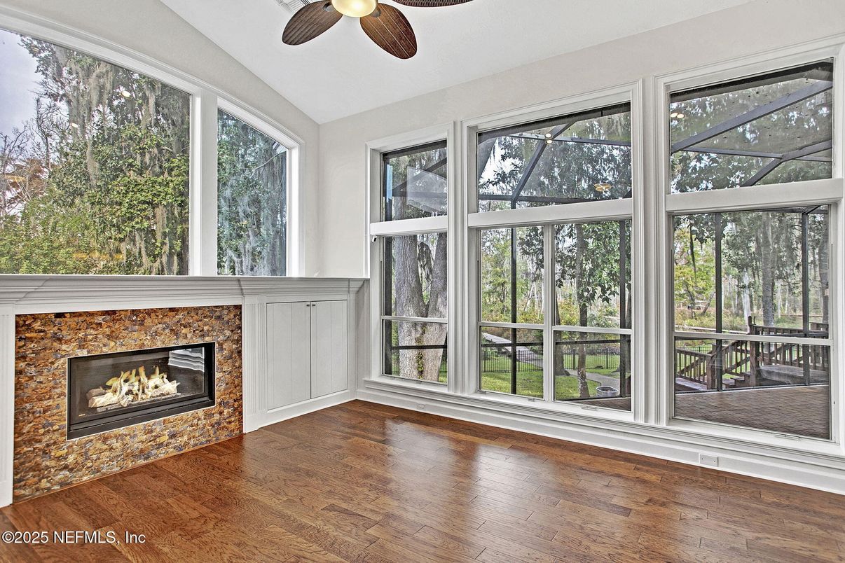 Empty room, Fireplace, Interior, Sun Room, Wood Texture Flooring