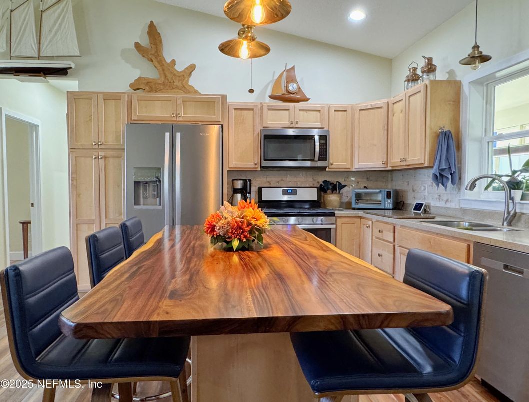 Dining room, Interior, Kitchen, Pendant Lights, Recessed Lighting, Stainless Steel Appliances, Wood Texture Flooring