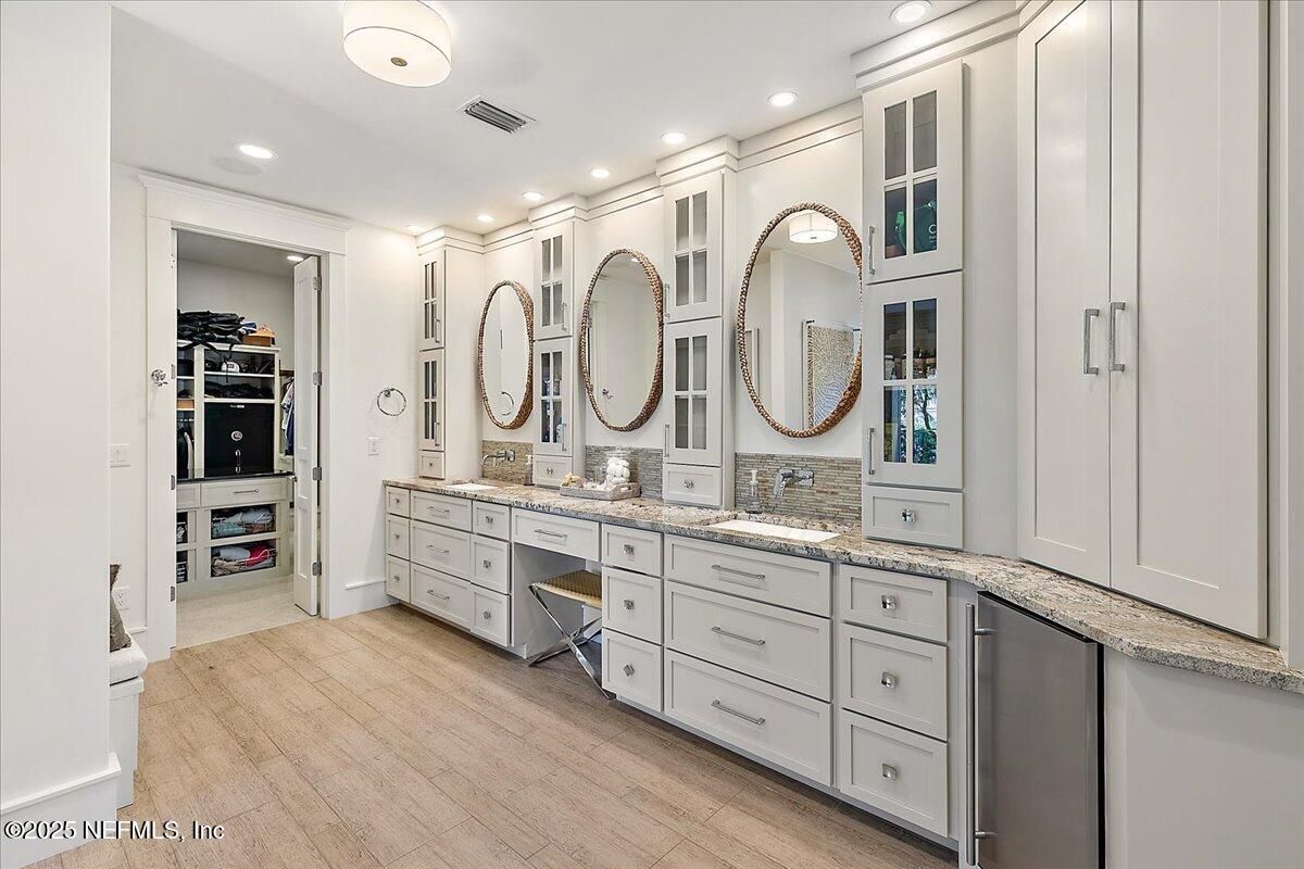 Bathroom, Dual Sink Vanities, Interior, Recessed Lighting, Wood Texture Flooring