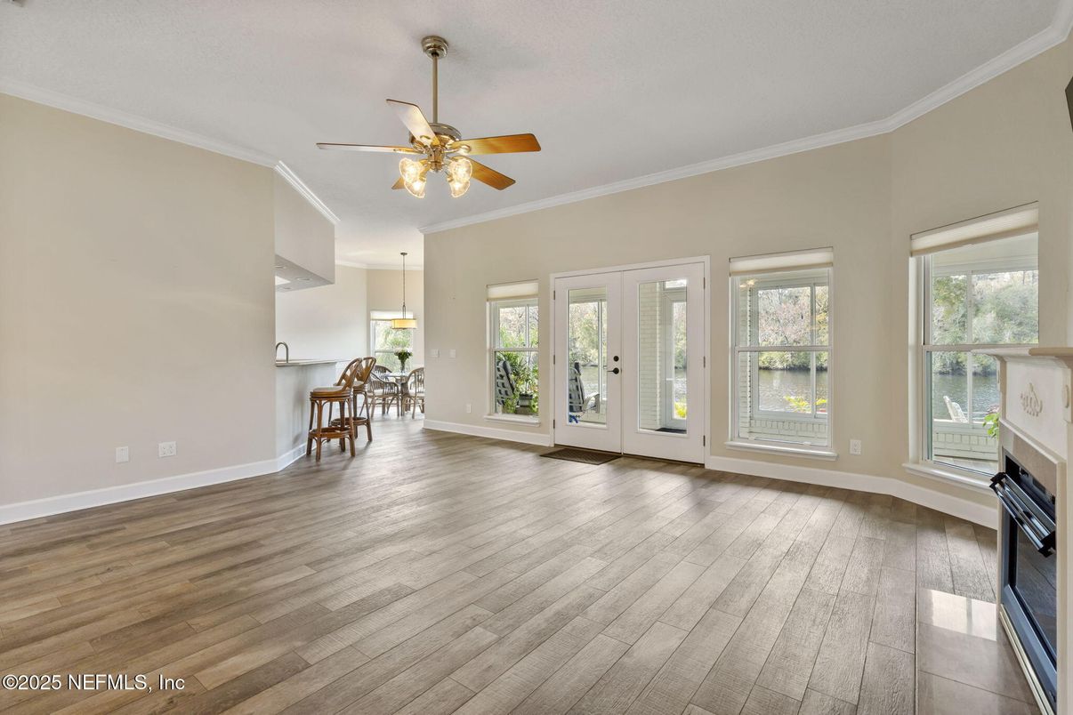 Chandelier, Dining room, Empty room, Fireplace, Interior, Pendant Lights, Wood Texture Flooring