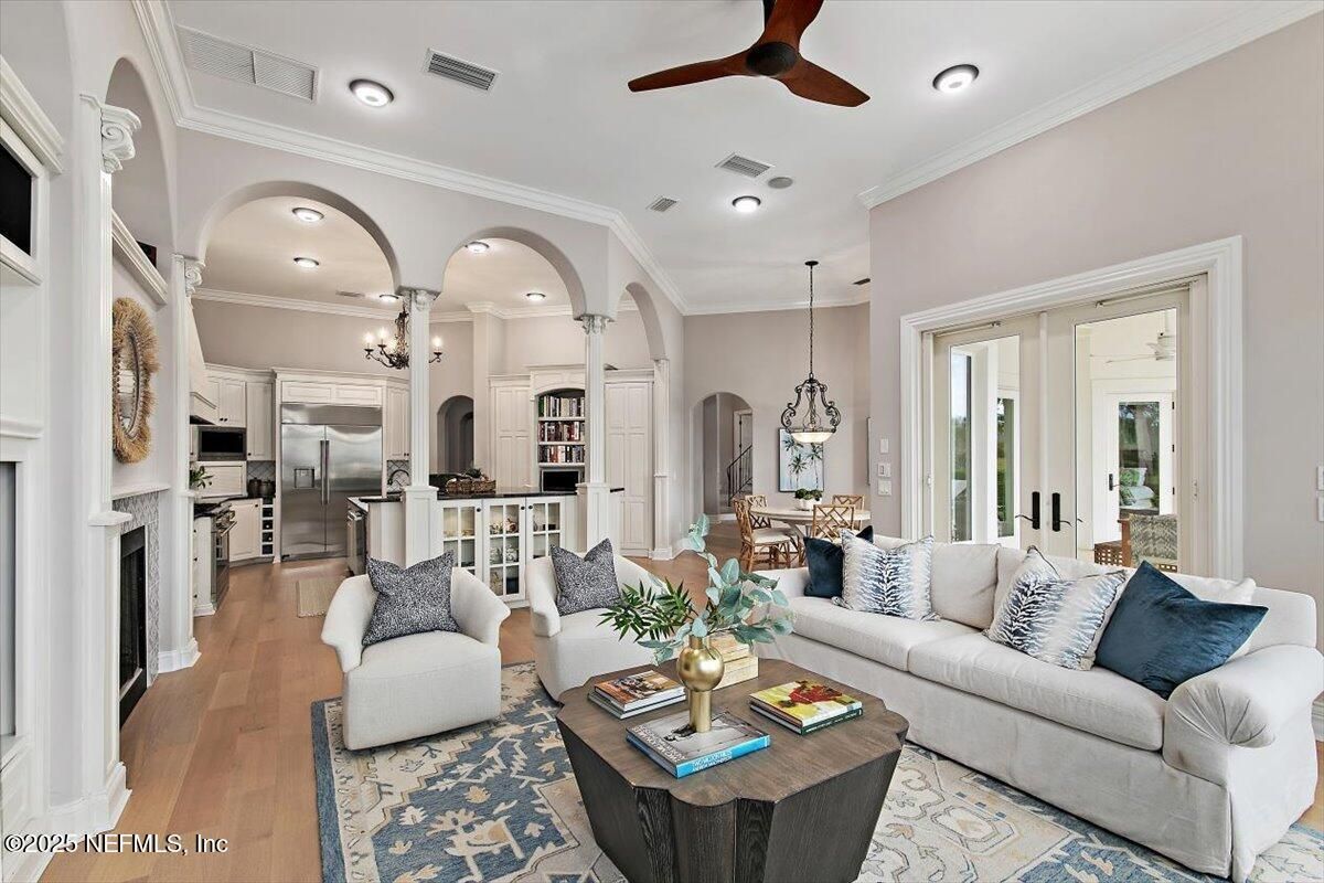 Dining room, Fireplace, Interior, Kitchen, Living room, Pendant Lights, Recessed Lighting, Stainless Steel Appliances, Wood Texture Flooring