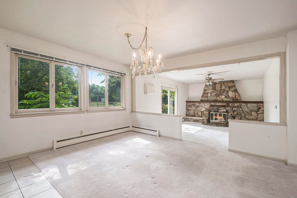 Chandelier, Empty room, Fireplace, Interior