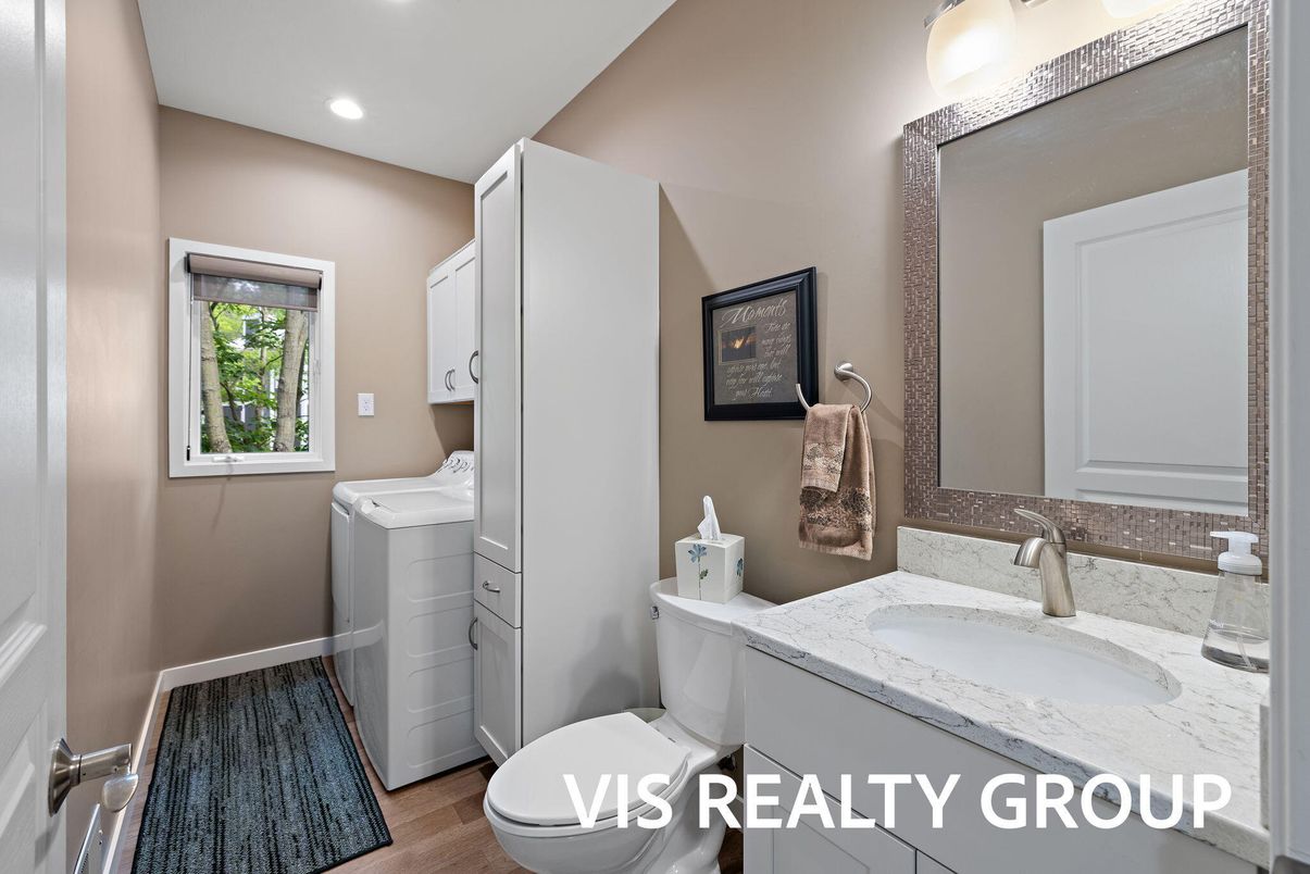 Bathroom, Interior, Recessed Lighting, Washer, Wood Texture Flooring