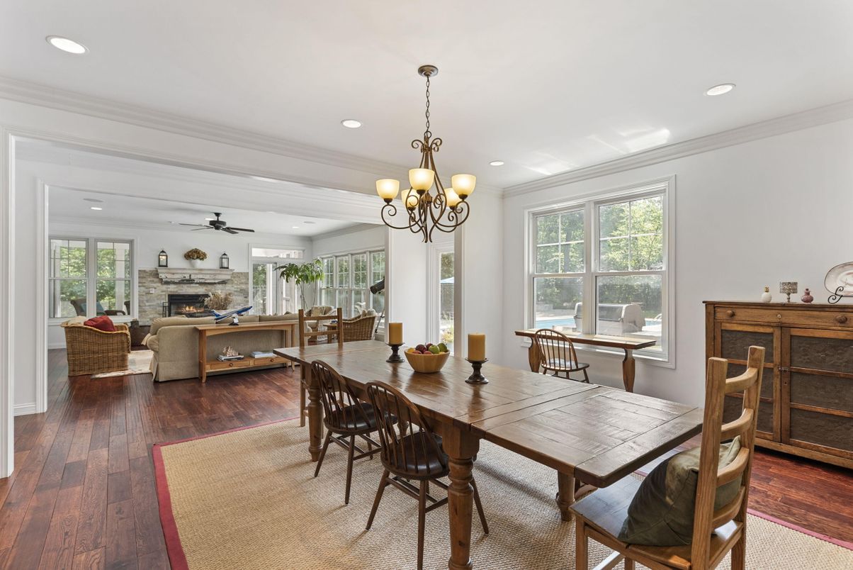 Chandelier, Dining room, Fireplace, Interior, Living room, Recessed Lighting, Wood Texture Flooring